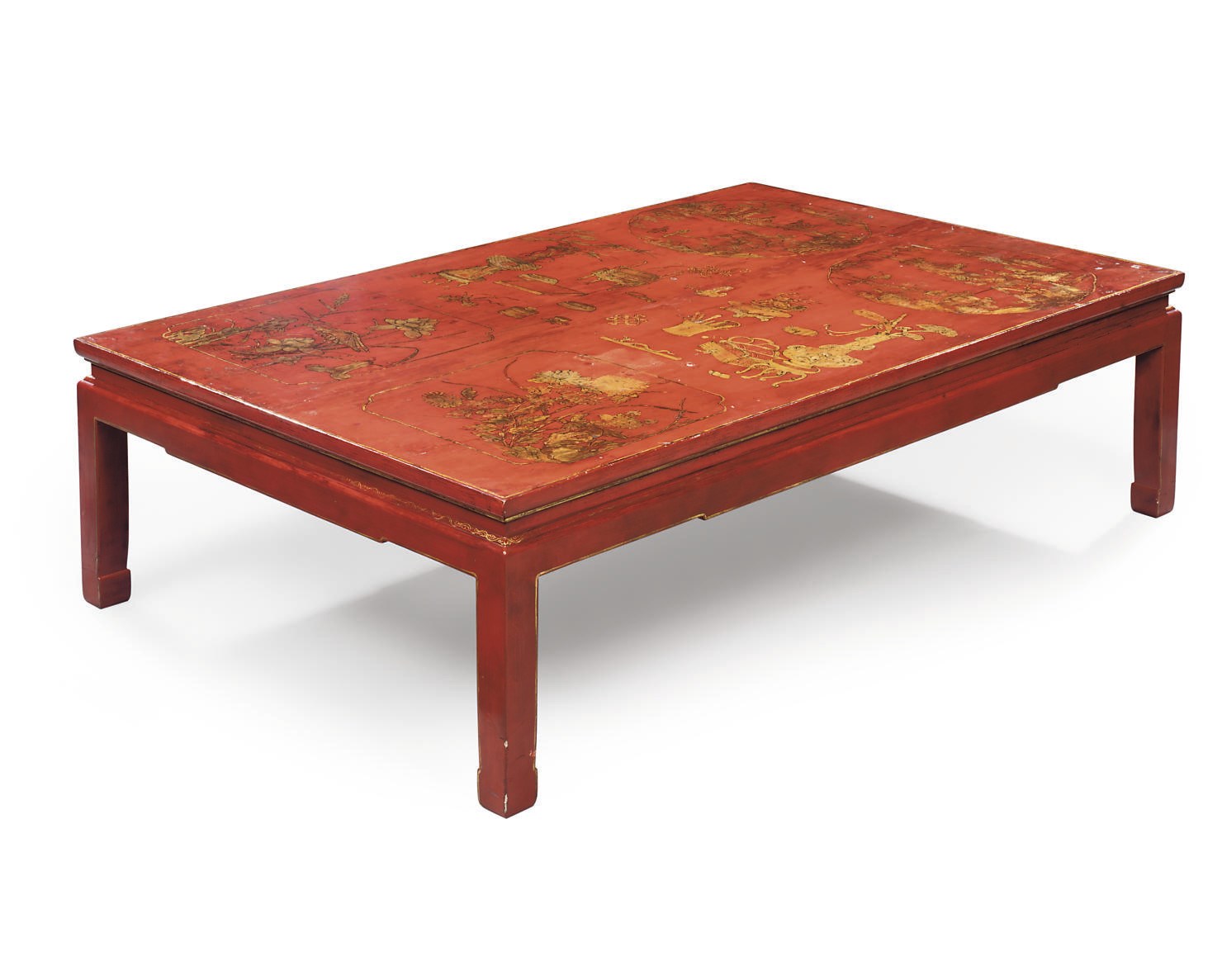 A CHINESE RED AND GILT-DECORATED LOW TABLE
