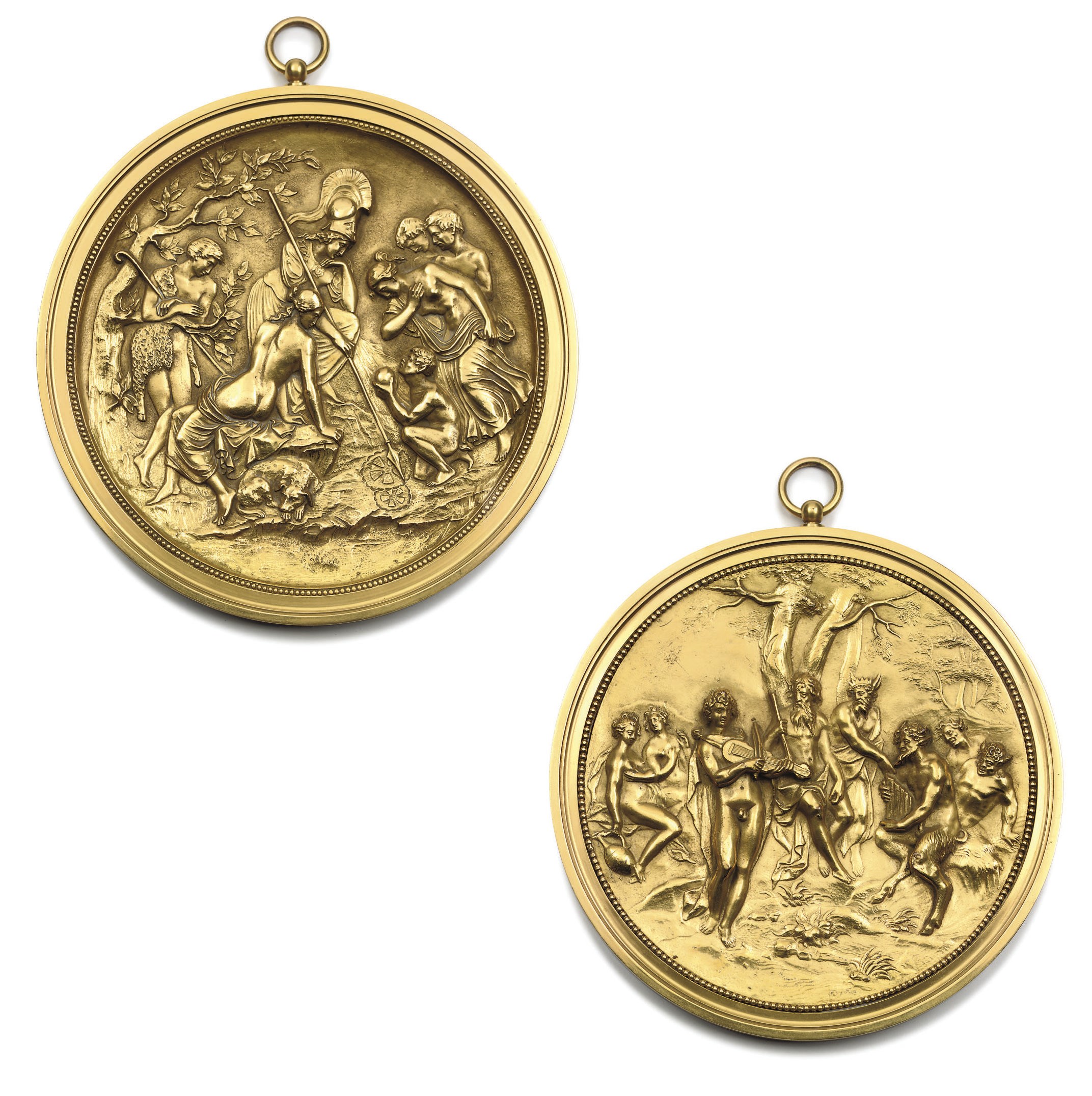 A NEAR PAIR OF FRENCH ORMOLU BAS-RELIEF ROUNDELS
