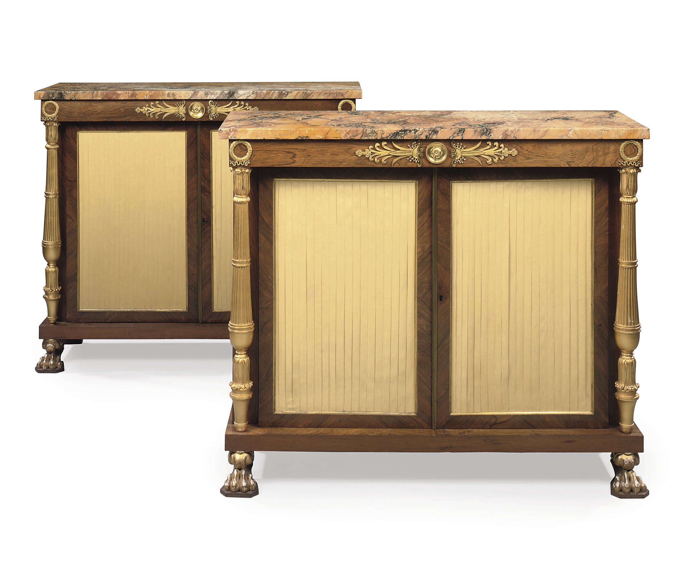 A PAIR OF REGENCY ORMOLU-MOUNTED AND PARCEL-GILT ROSEWOOD SIDE CABINETS