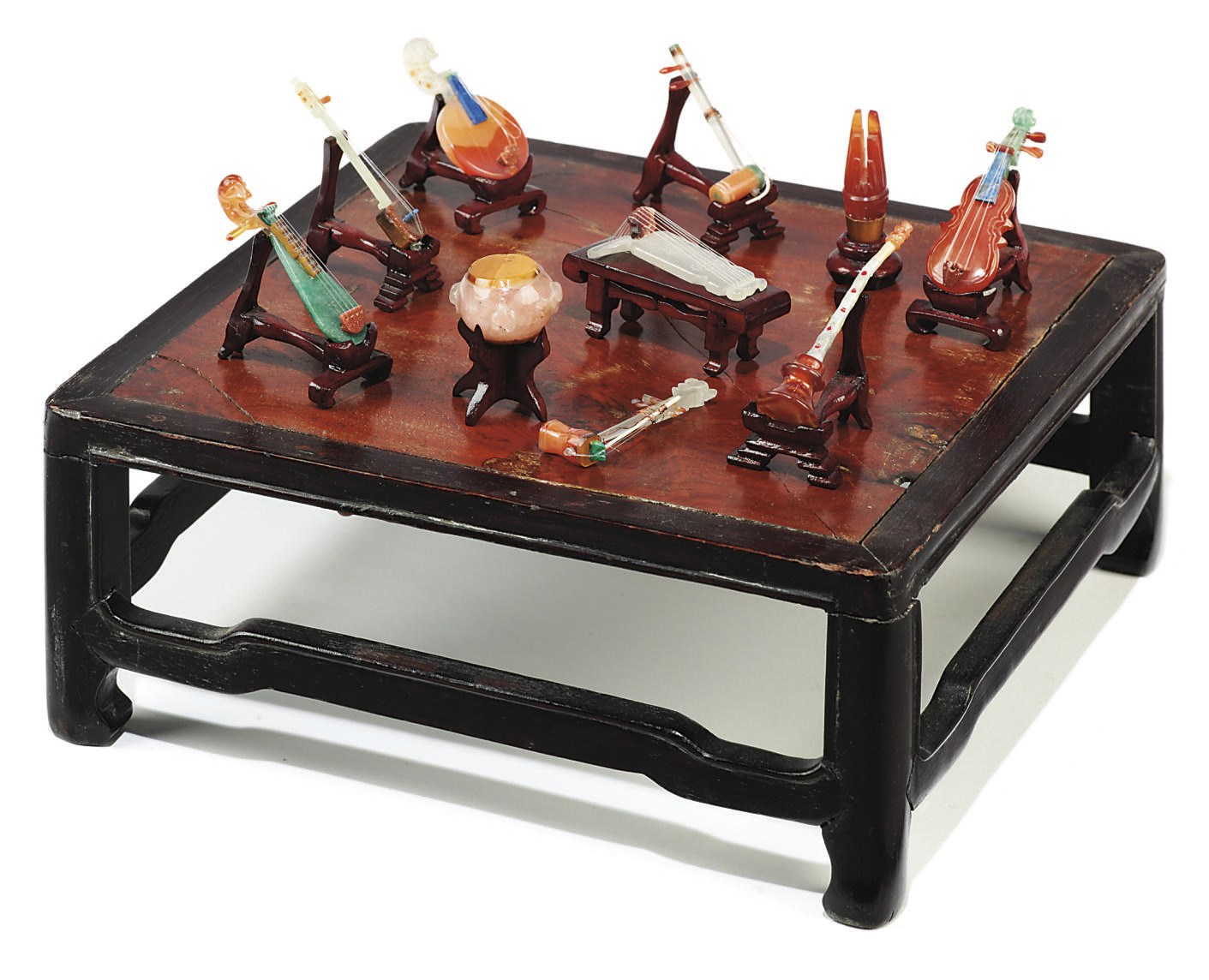 A SET OF TEN CHINESE HARDSTONE MINIATURE MUSICAL INSTRUMENTS