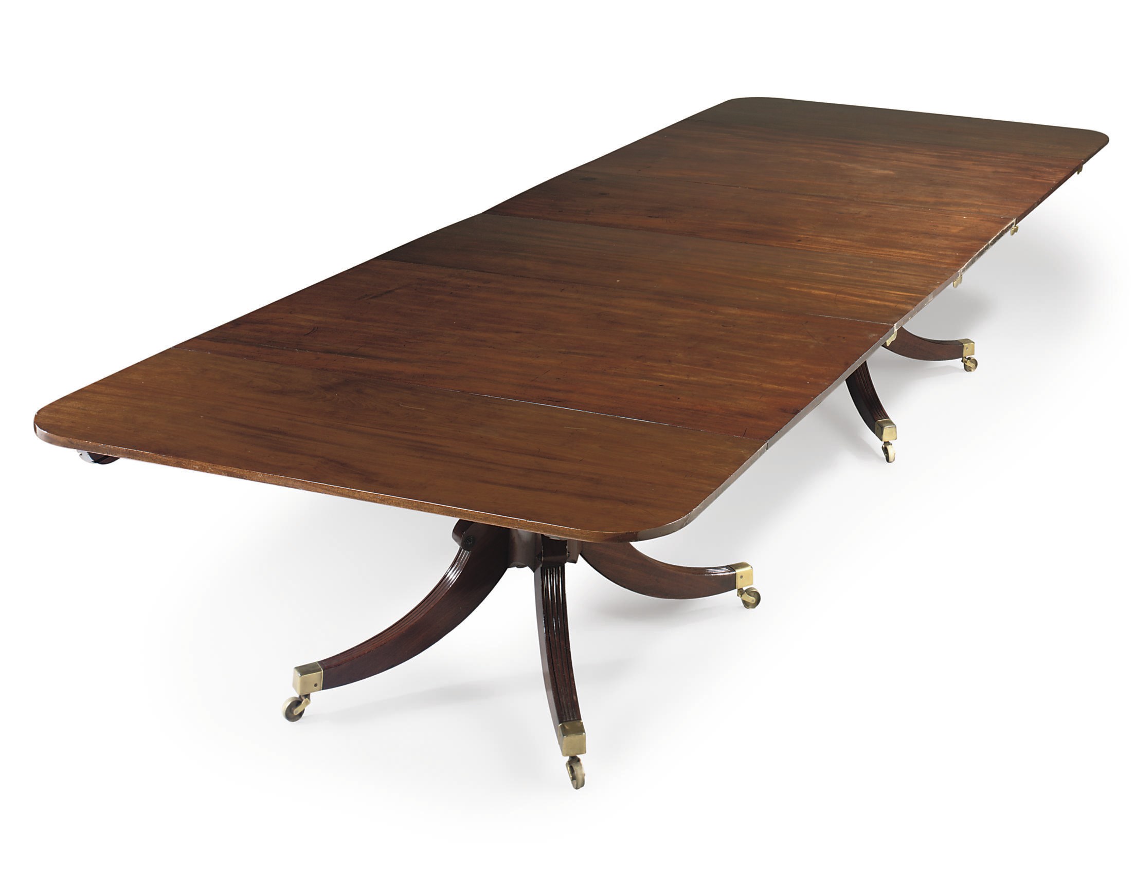 A REGENCY MAHOGANY TWIN-PEDESTAL DINING-TABLE