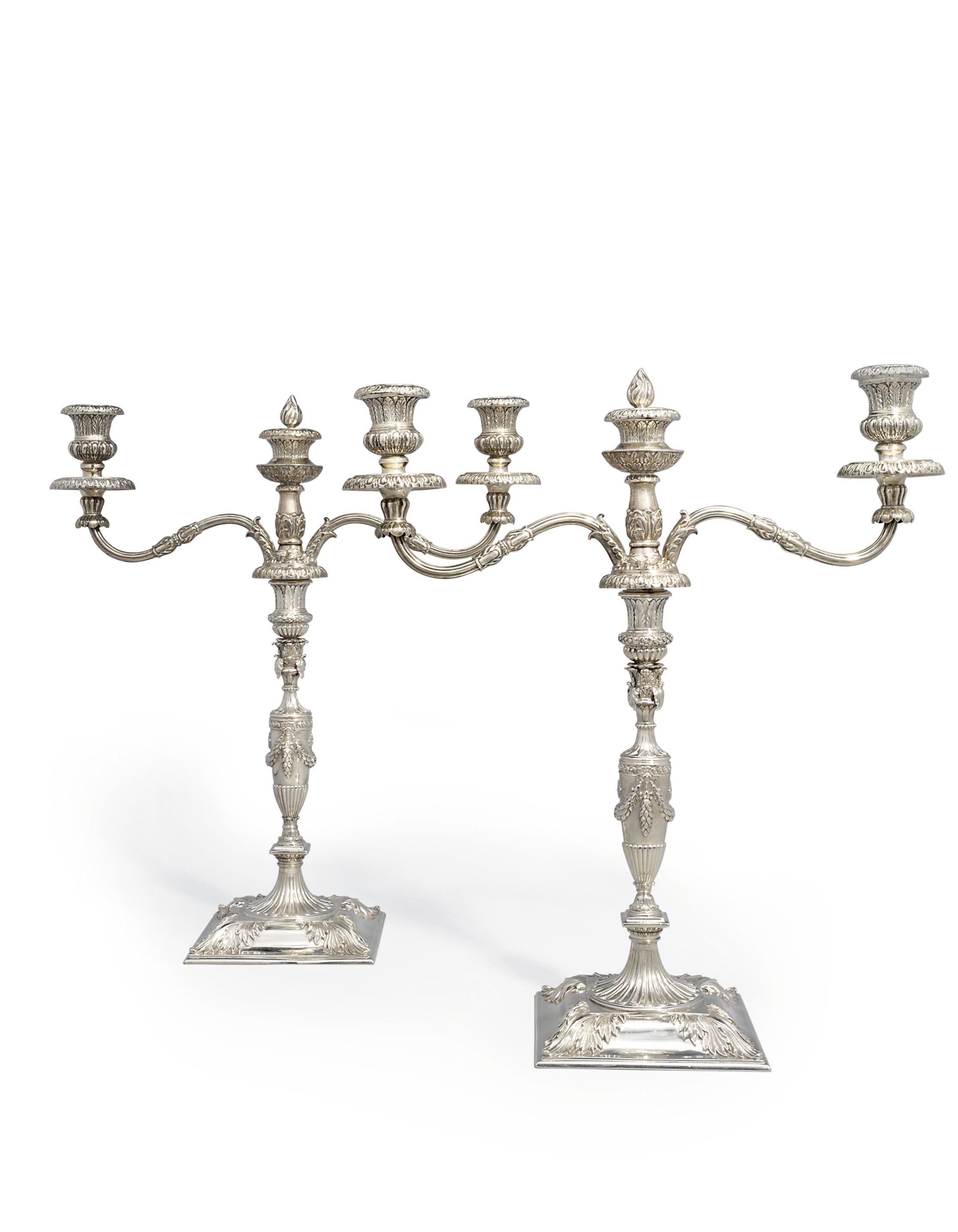 A PAIR OF GEORGE III SILVER CANDLESTICKS WITH A PAIR OF GEORGE III SILVER THREE-LIGHT CANDLEARMS TO MATCH