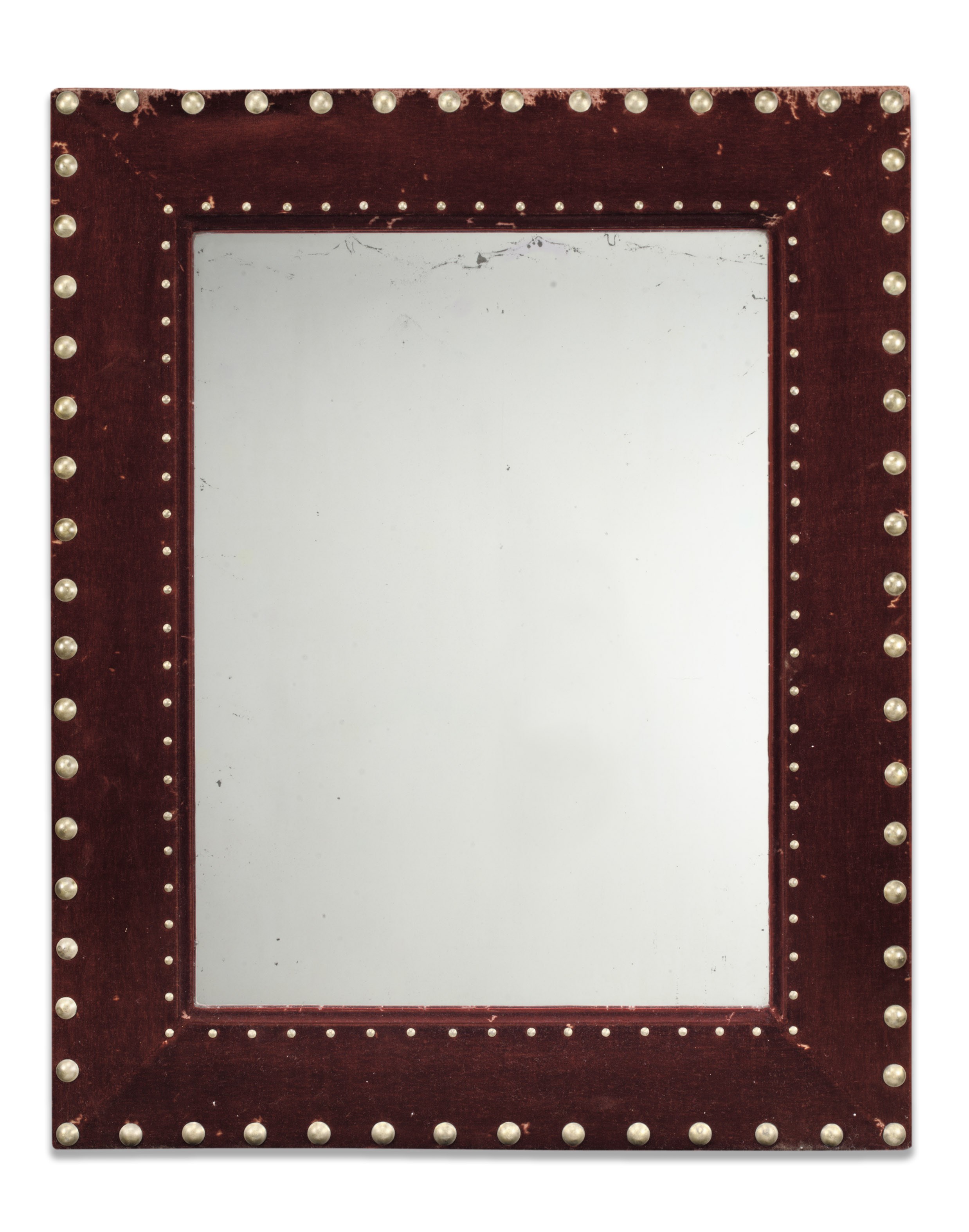 A FRENCH BRASS-STUDDED CLARET-RED VELVET-FRAMED MIRROR