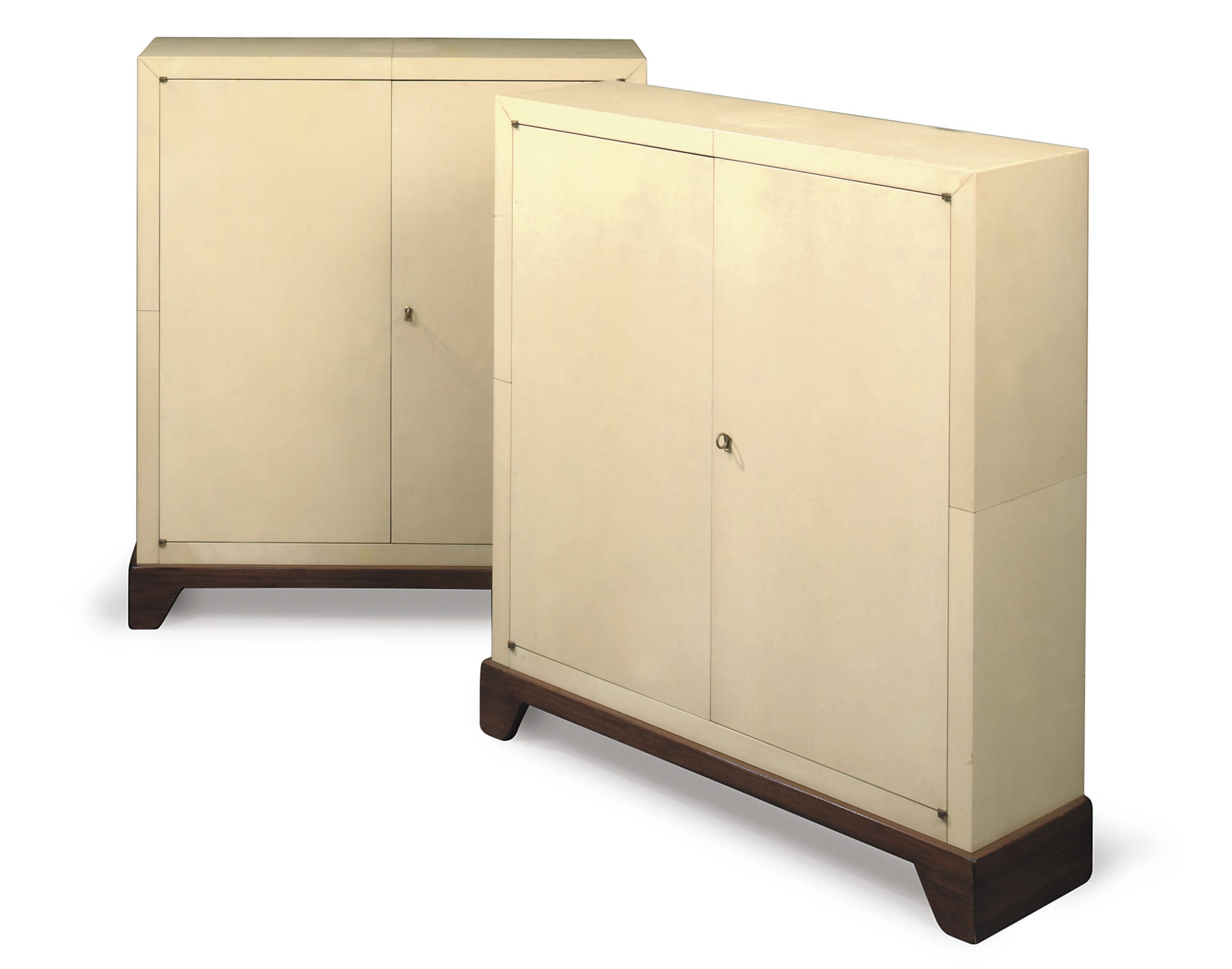 A PAIR OF FRENCH PARCHMENT-VENEERED AND WALNUT LOW CABINETS