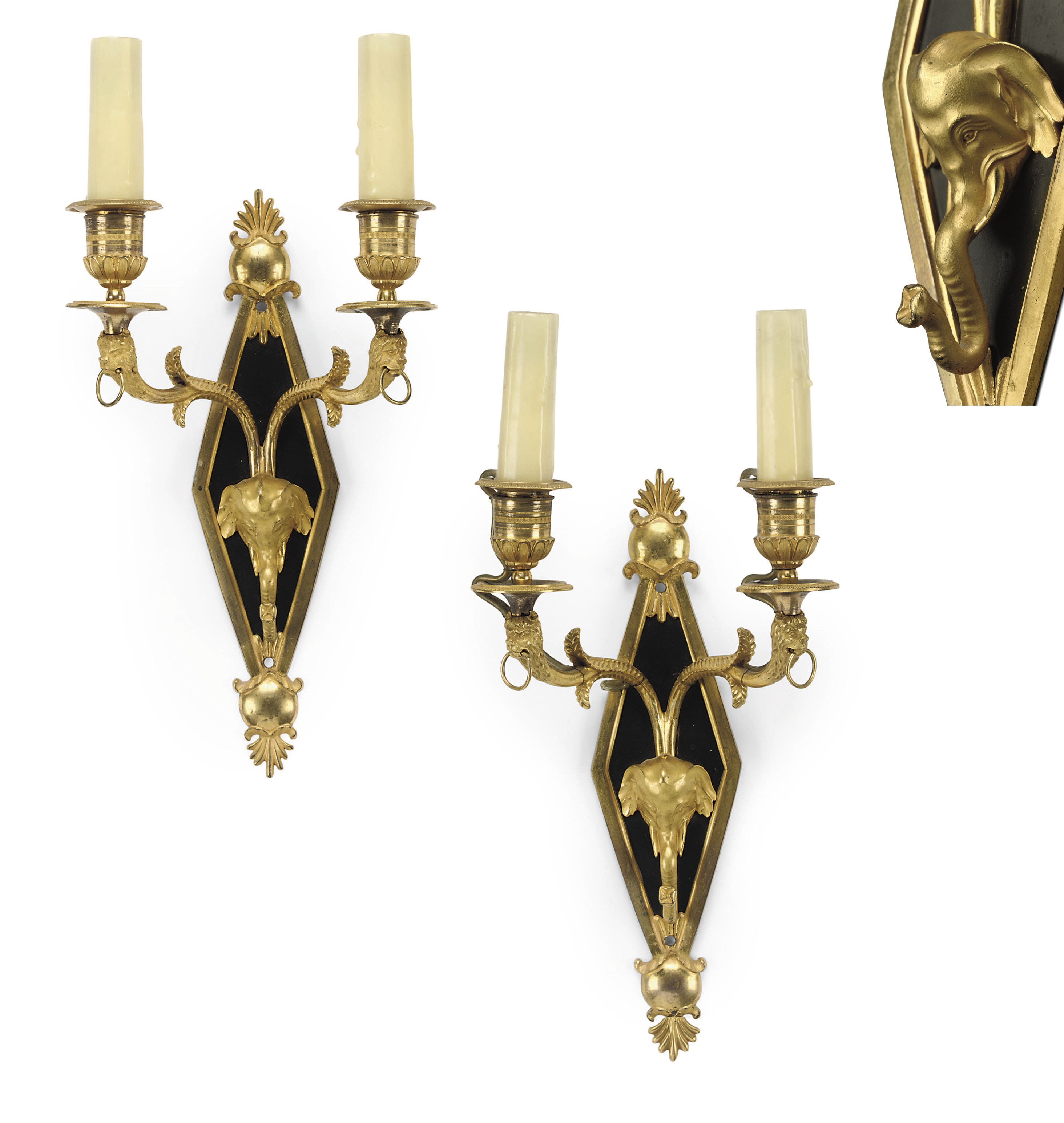 A PAIR OF DIRECTOIRE ORMOLU AND BRONZE TWIN-BRANCH WALL LIGHTS