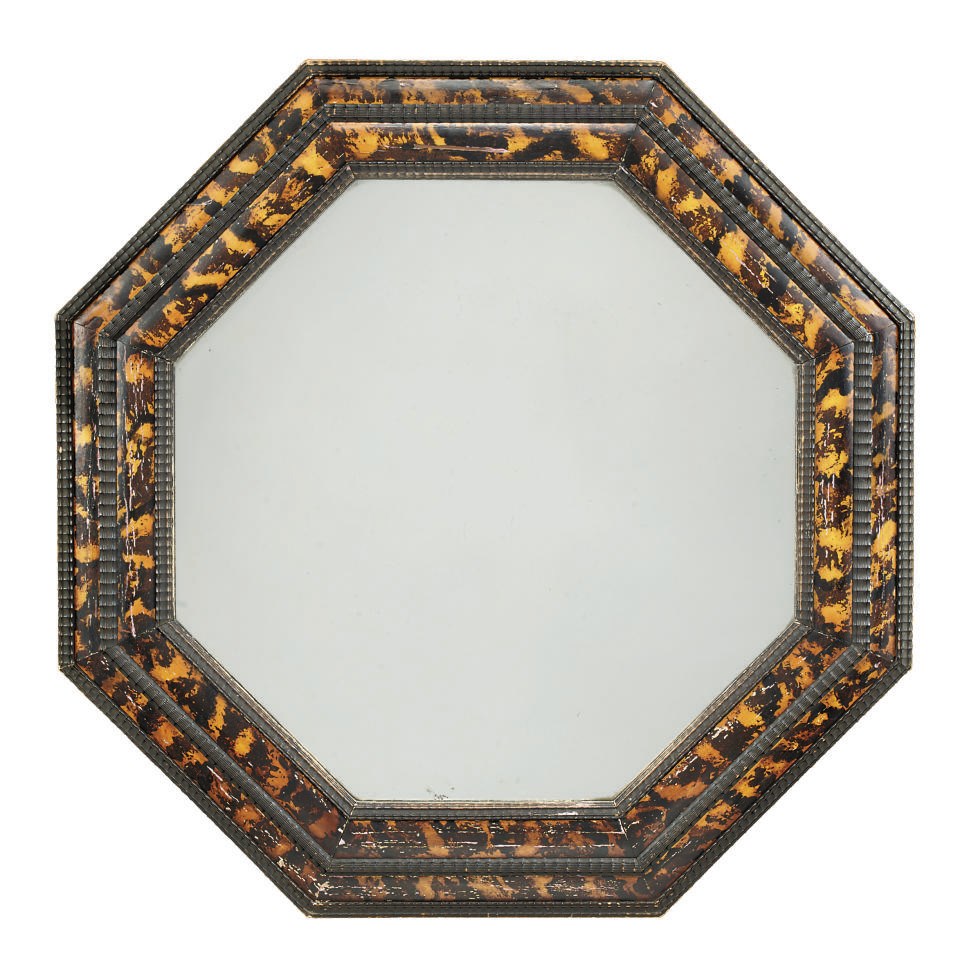 A LIEGE EBONISED AND SIMULATED TORTOISESHELL MIRROR