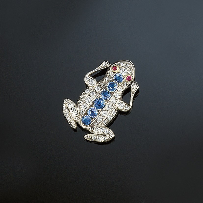 A diamond, sapphire and ruby novelty brooch