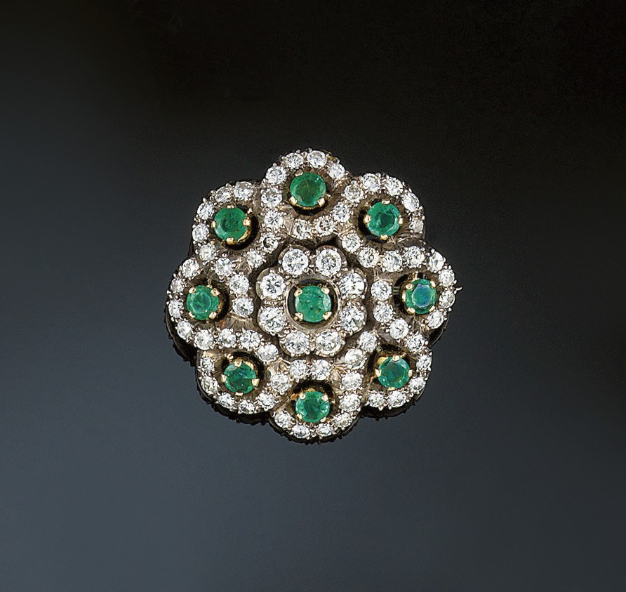 An emerald and diamond brooch/pendant