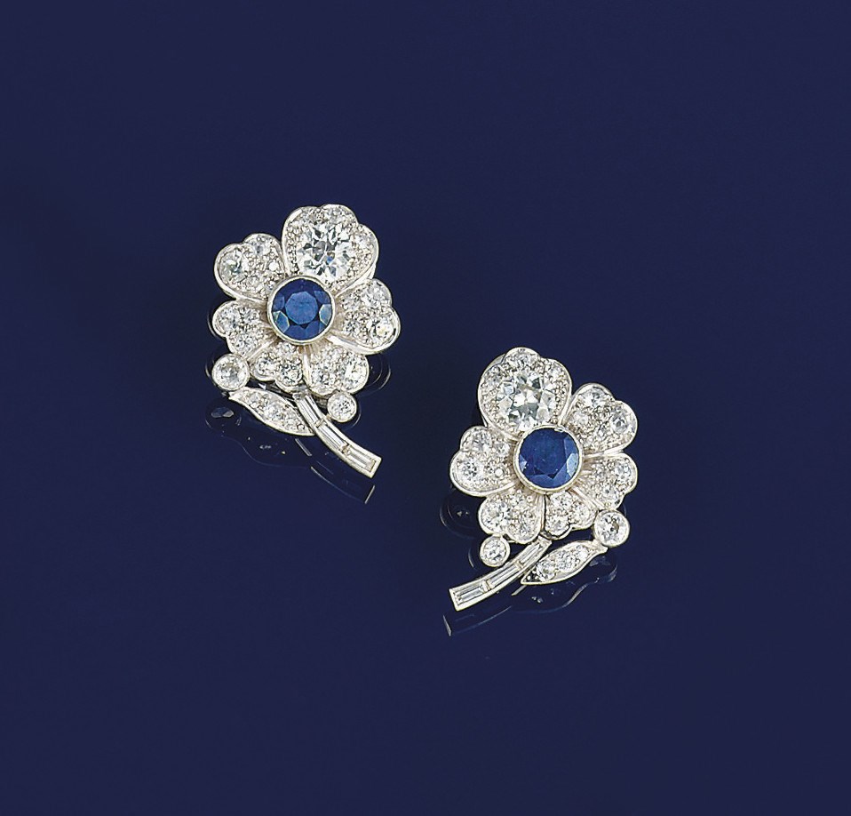 A pair of sapphire and diamond earclips