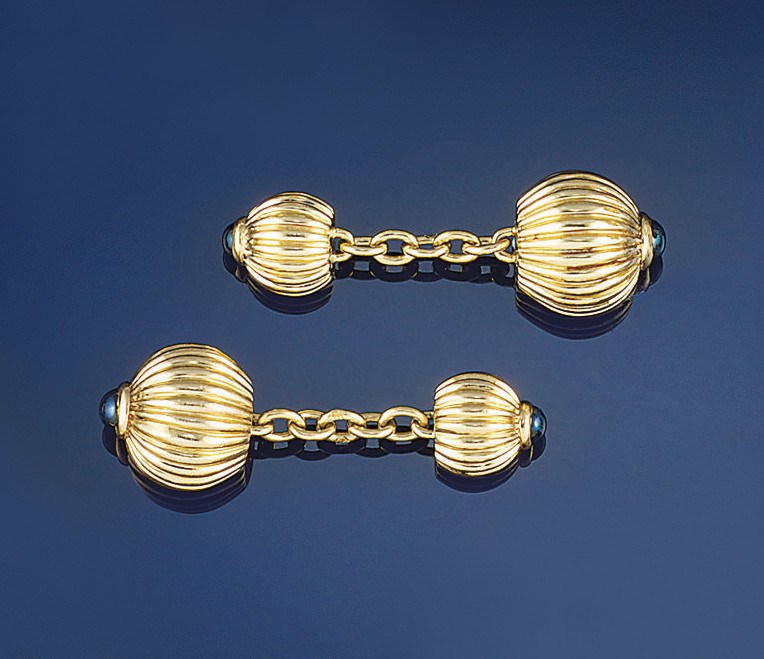 A pair of sapphire set cufflinks, by Cartier