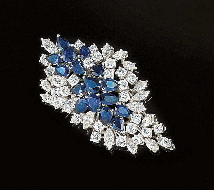 A sapphire and diamond brooch