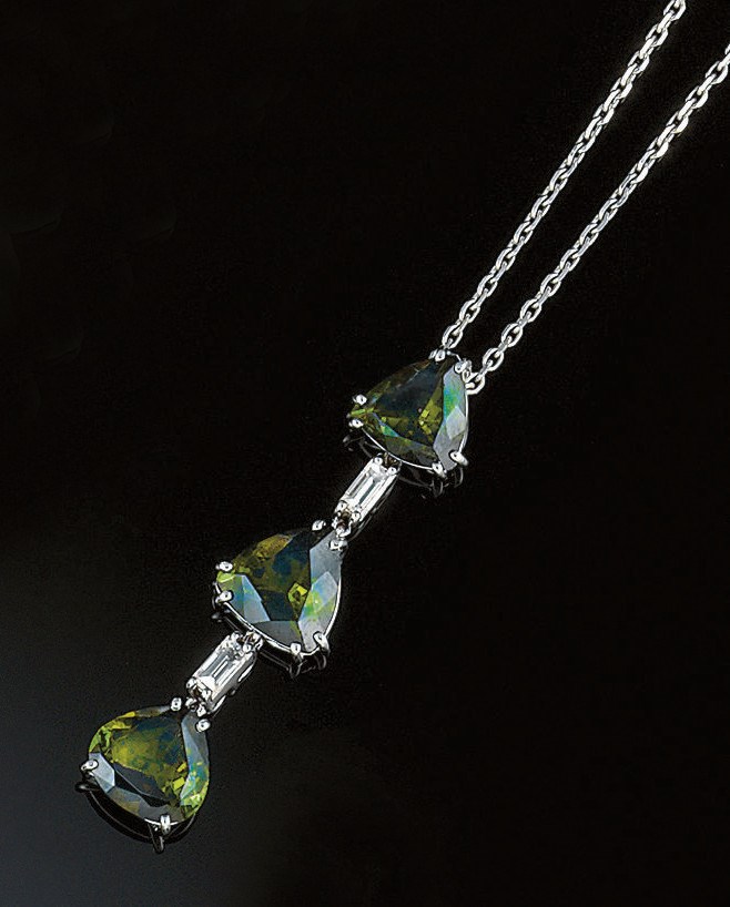 A green tourmaline and diamond pendant necklace