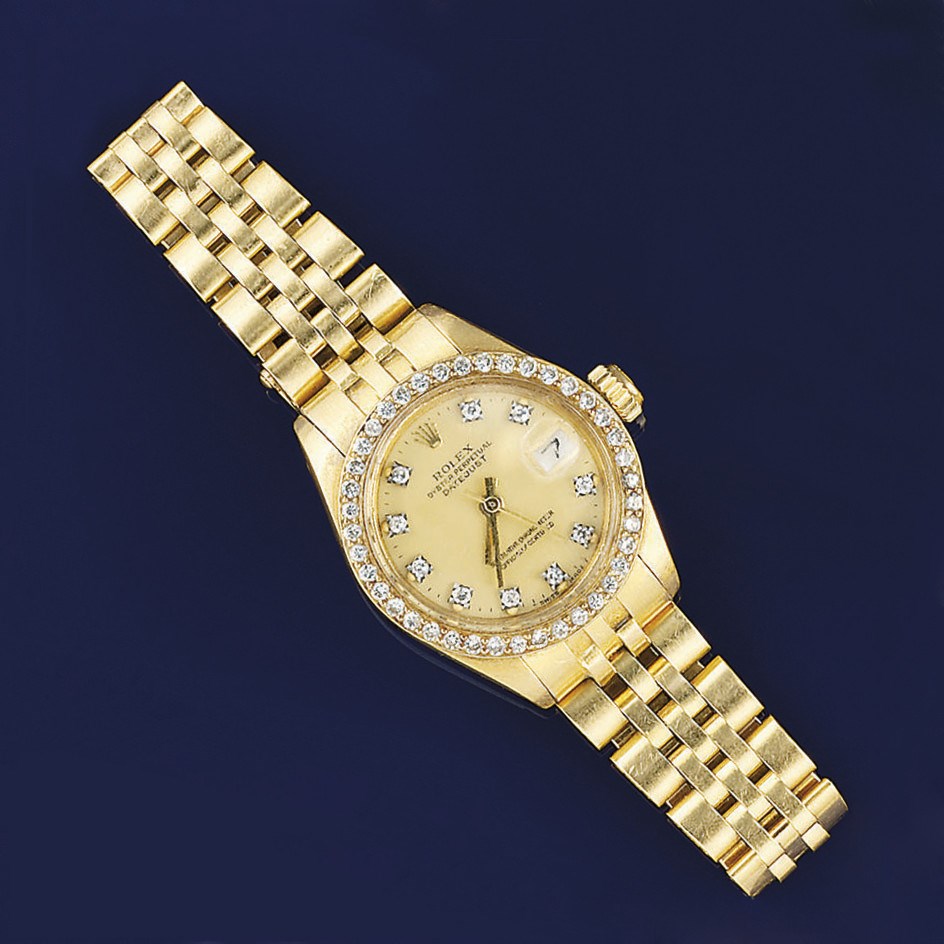 A lady's 18ct. gold and later diamond set automatic wristwatch, by Rolex