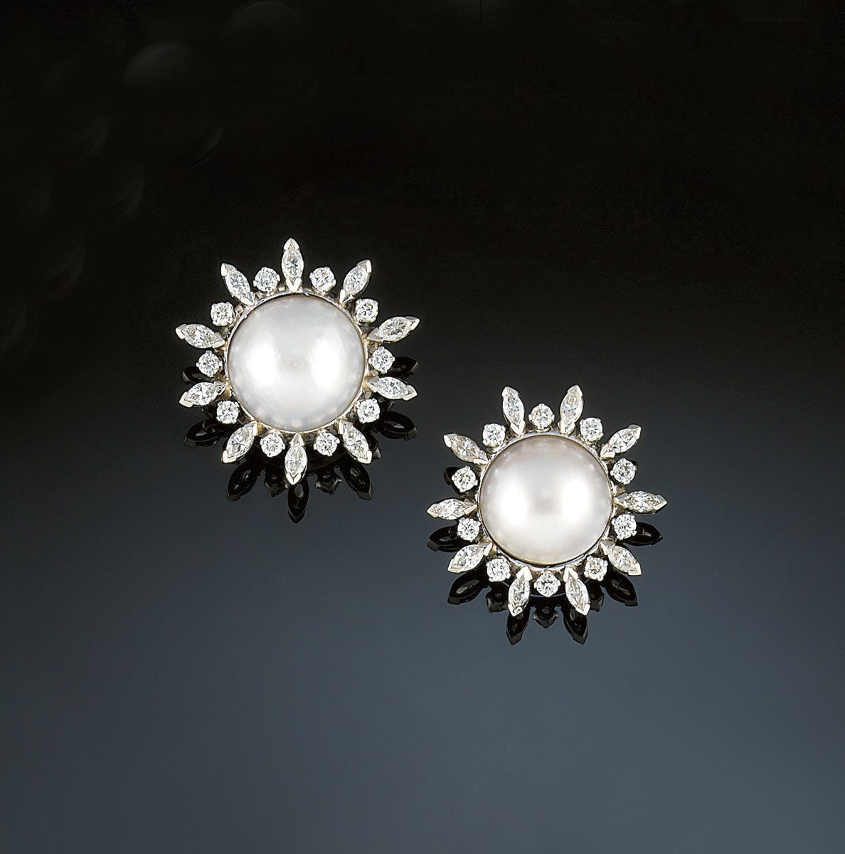 A pair of diamond and cultured mabé pearl earclips