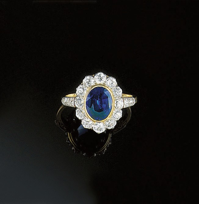A sapphire and diamond cluster ring