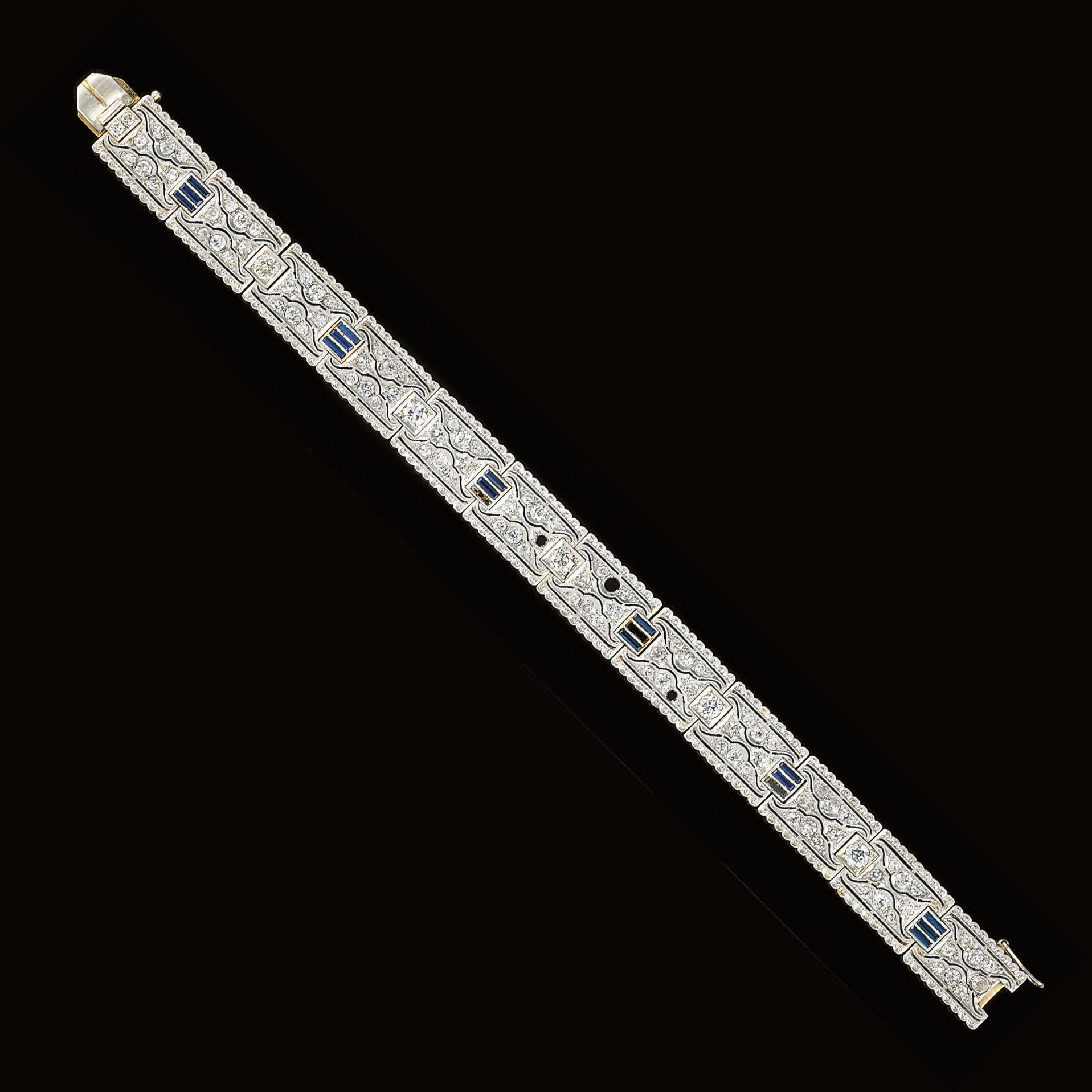 A diamond and synthetic sapphire bracelet