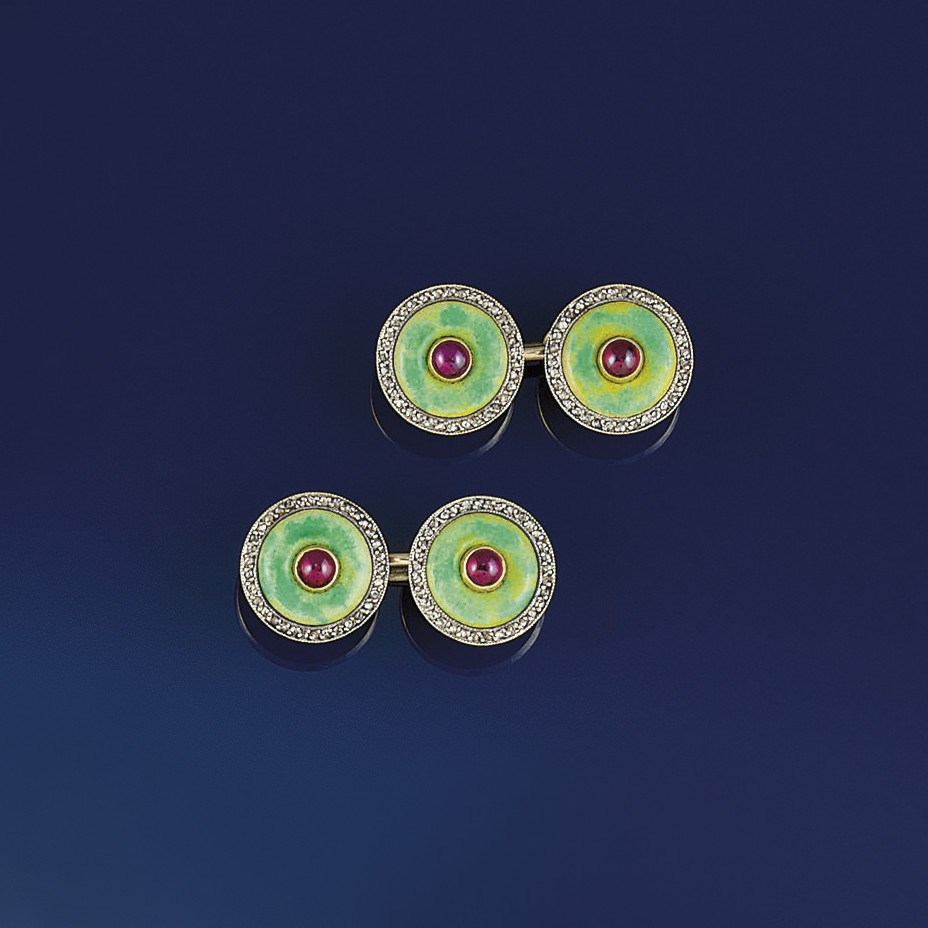 A pair of diamond, ruby and enamel cufflinks, by Cartier