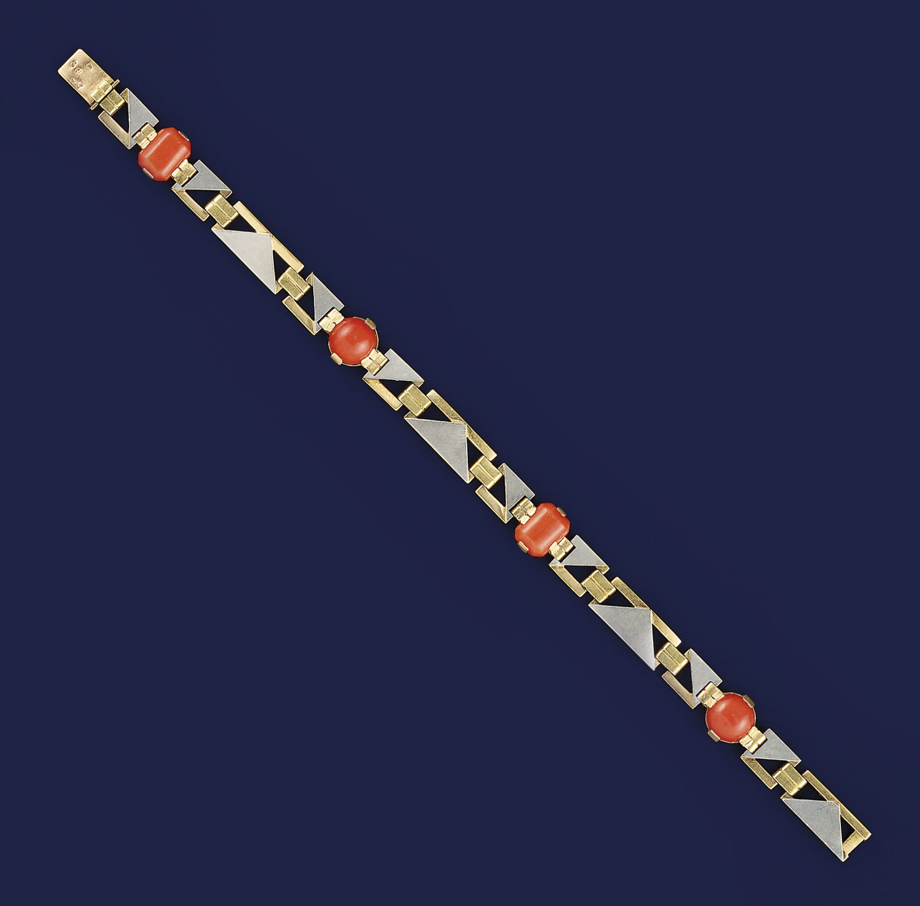 A French Art Deco gold, platinum and coral bracelet