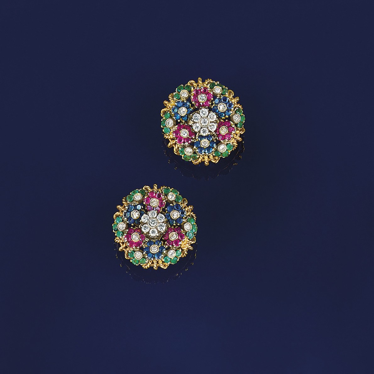 A pair of diamond and gem cluster earstuds