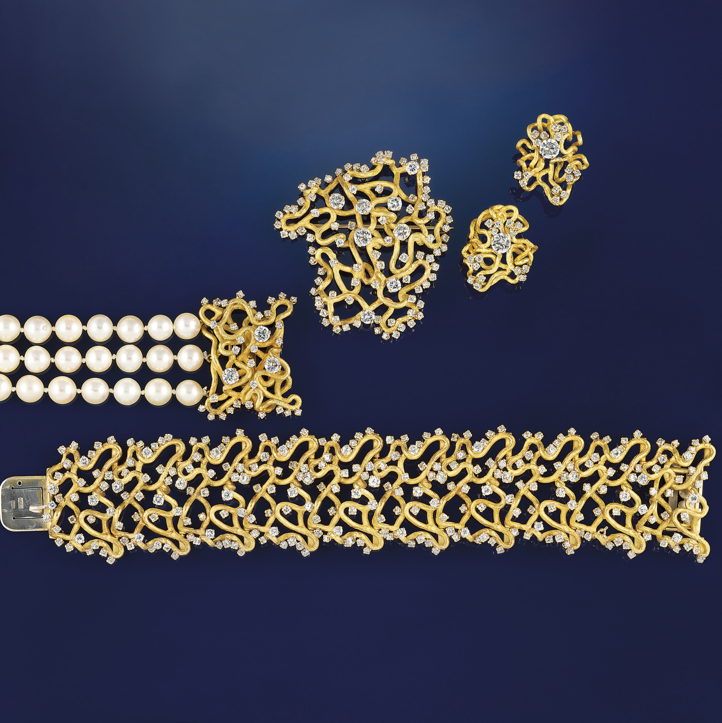 A suite of diamond set jewellery