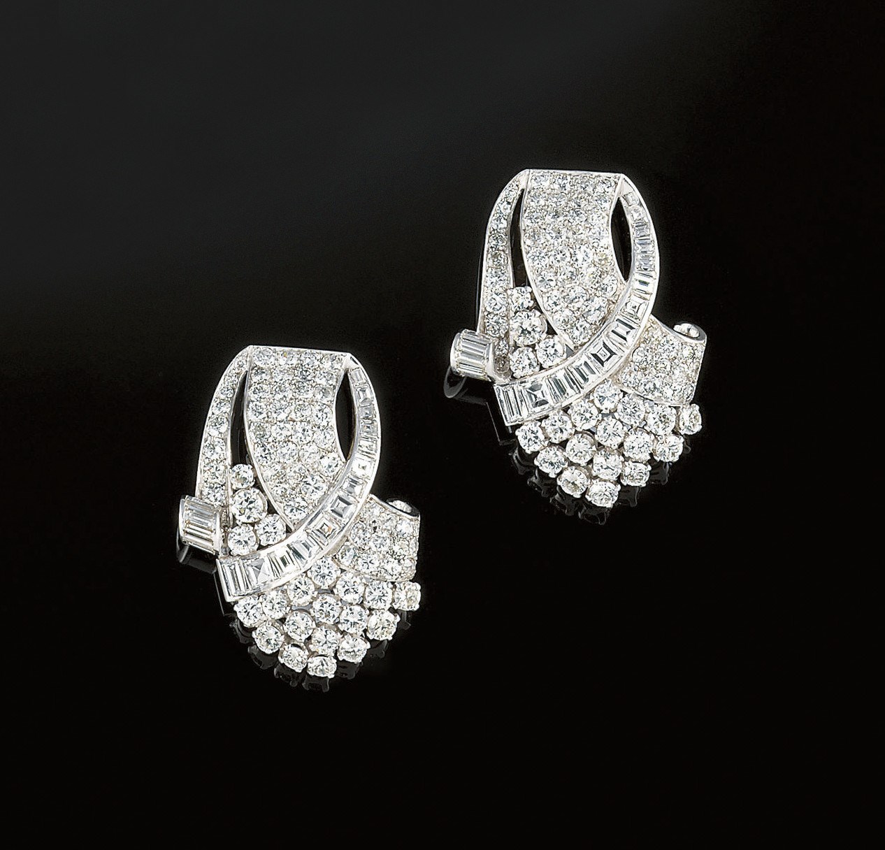 A pair of diamond earclips