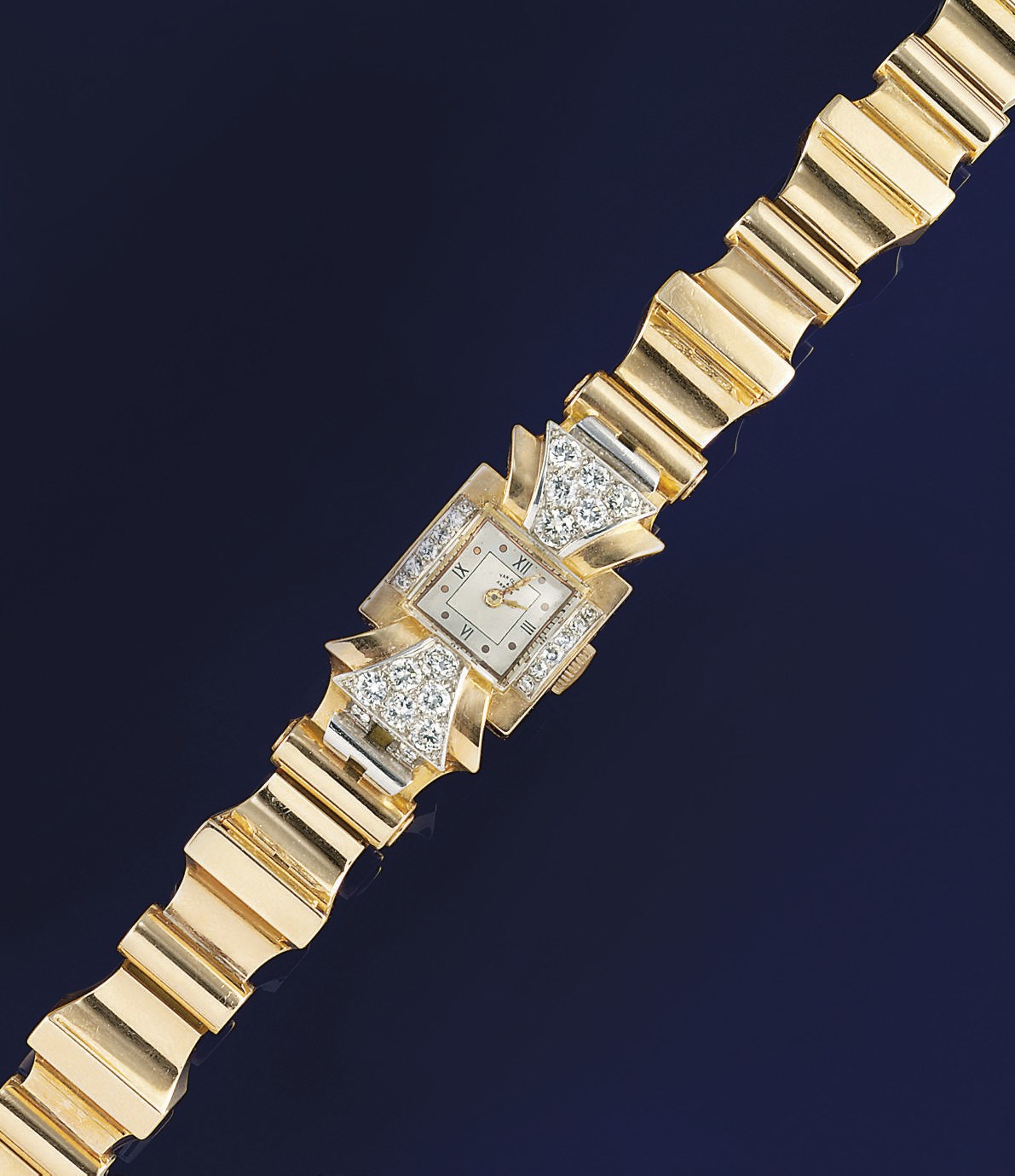 A lady's diamond set gold wristwatch, by Van Cleef & Arpels