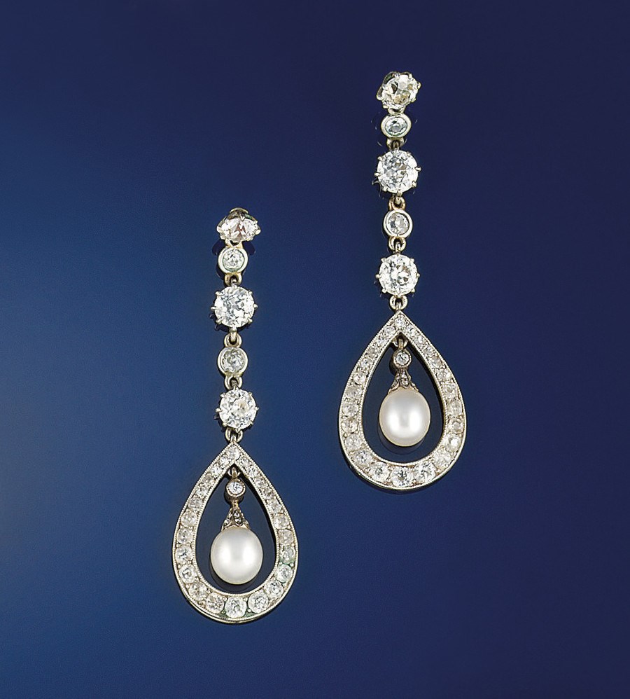 A pair of Edwardian pearl and diamond earrings