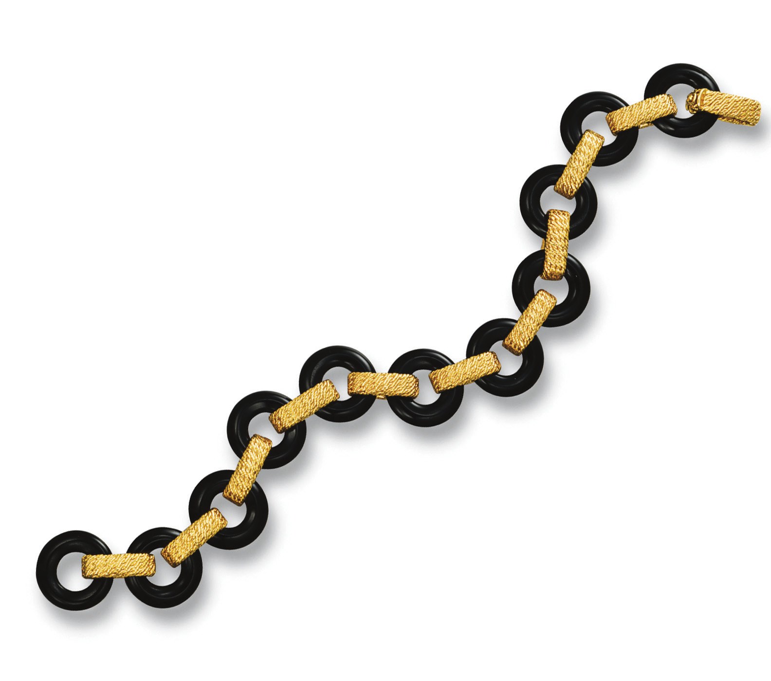 AN ONYX AND GOLD BRACELET, BY VAN CLEEF & ARPELS