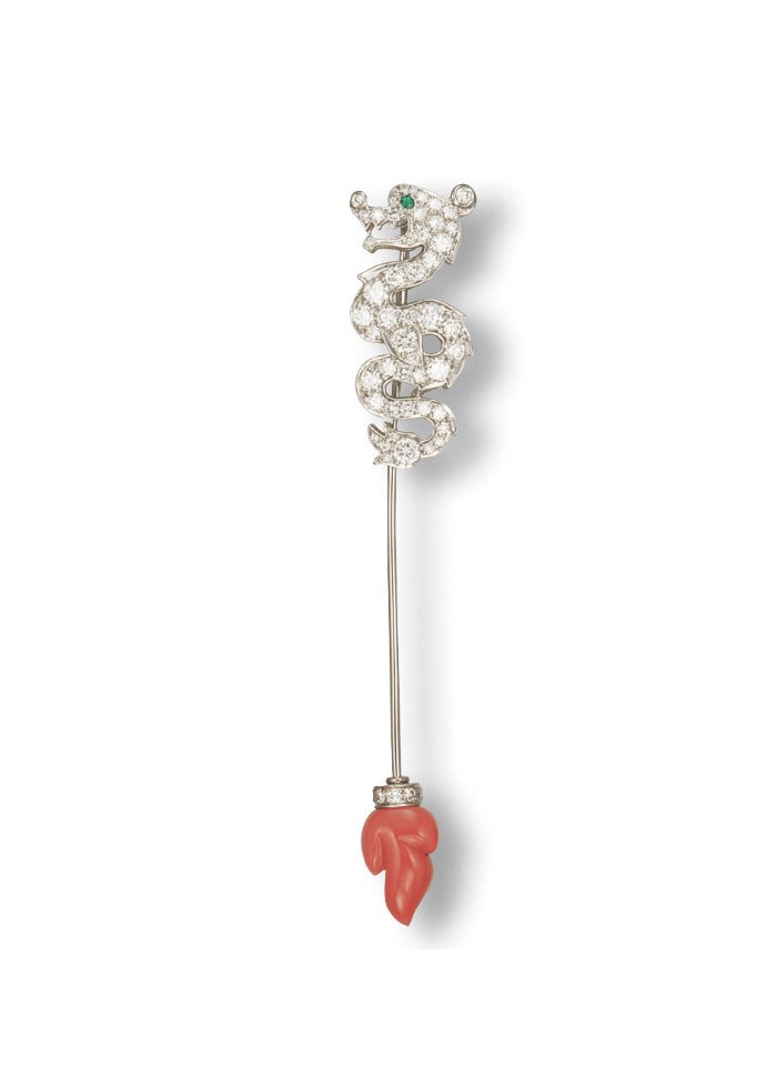 **A CORAL, DIAMOND AND EMERALD JABOT PIN, BY CARTIER