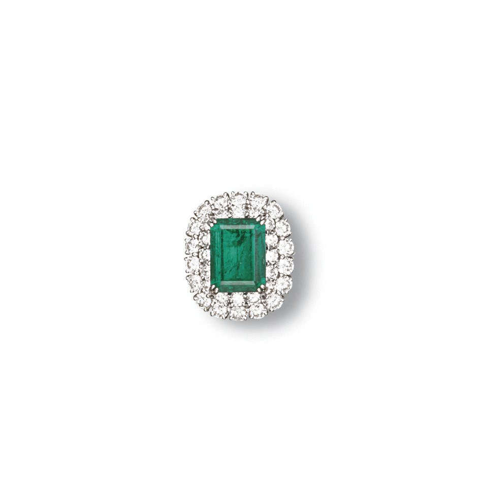 AN EMERALD AND DIAMOND RING
