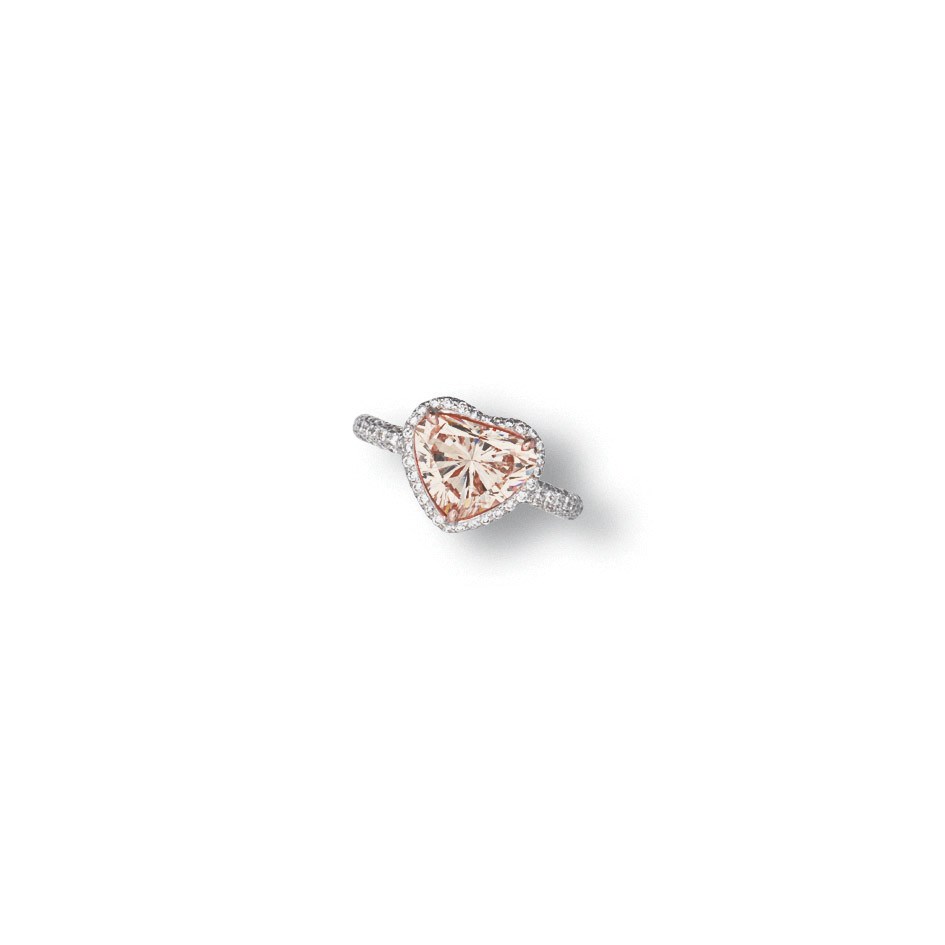 A COLOURED DIAMOND AND DIAMOND RING