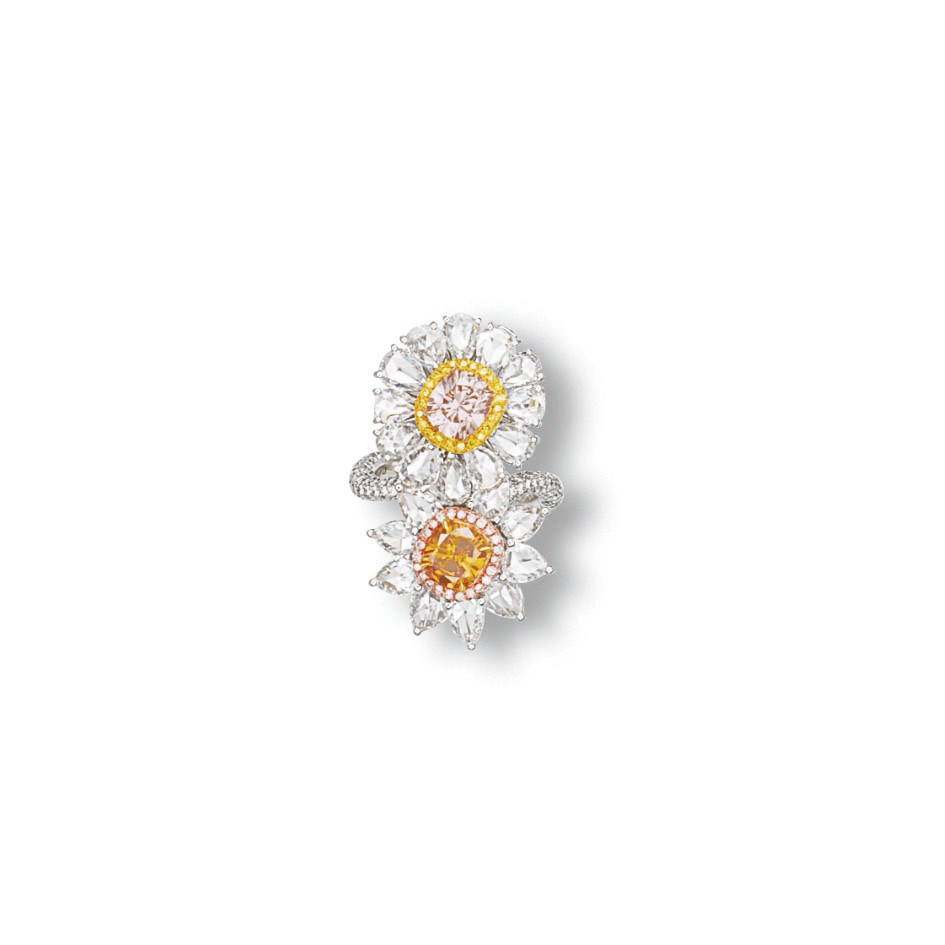 A COLOURED DIAMOND AND DIAMOND RING