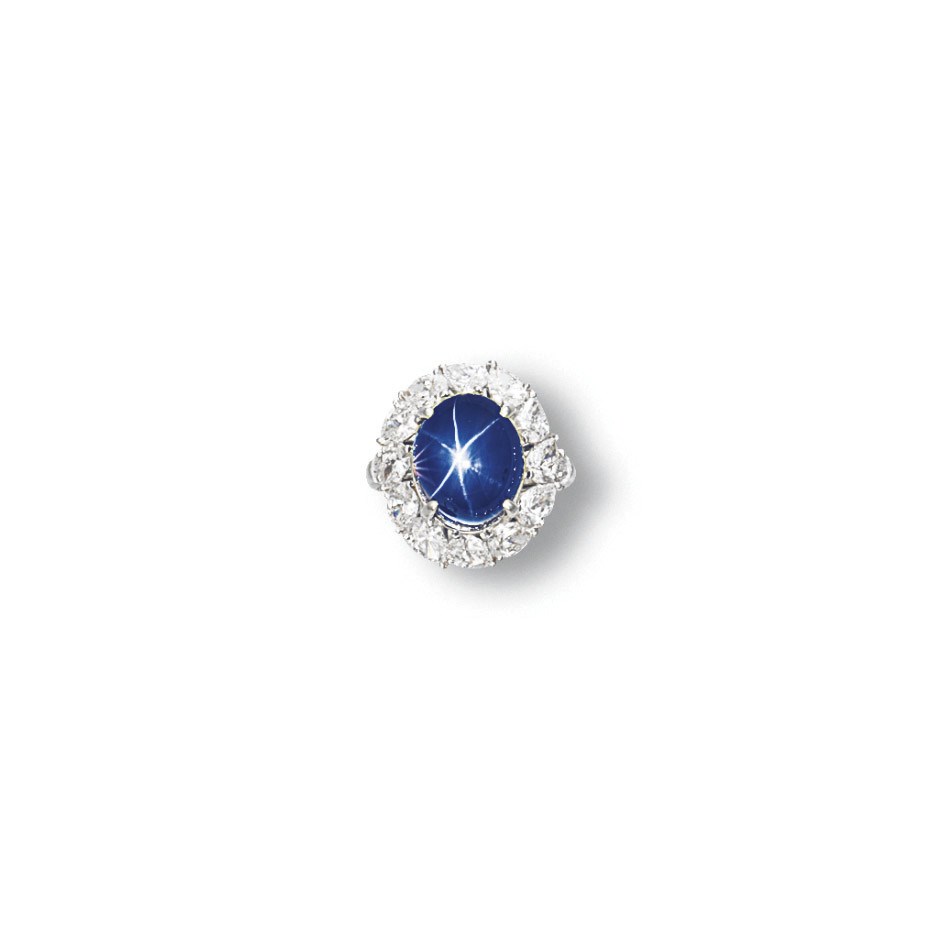 A STAR SAPPHIRE AND DIAMOND RING