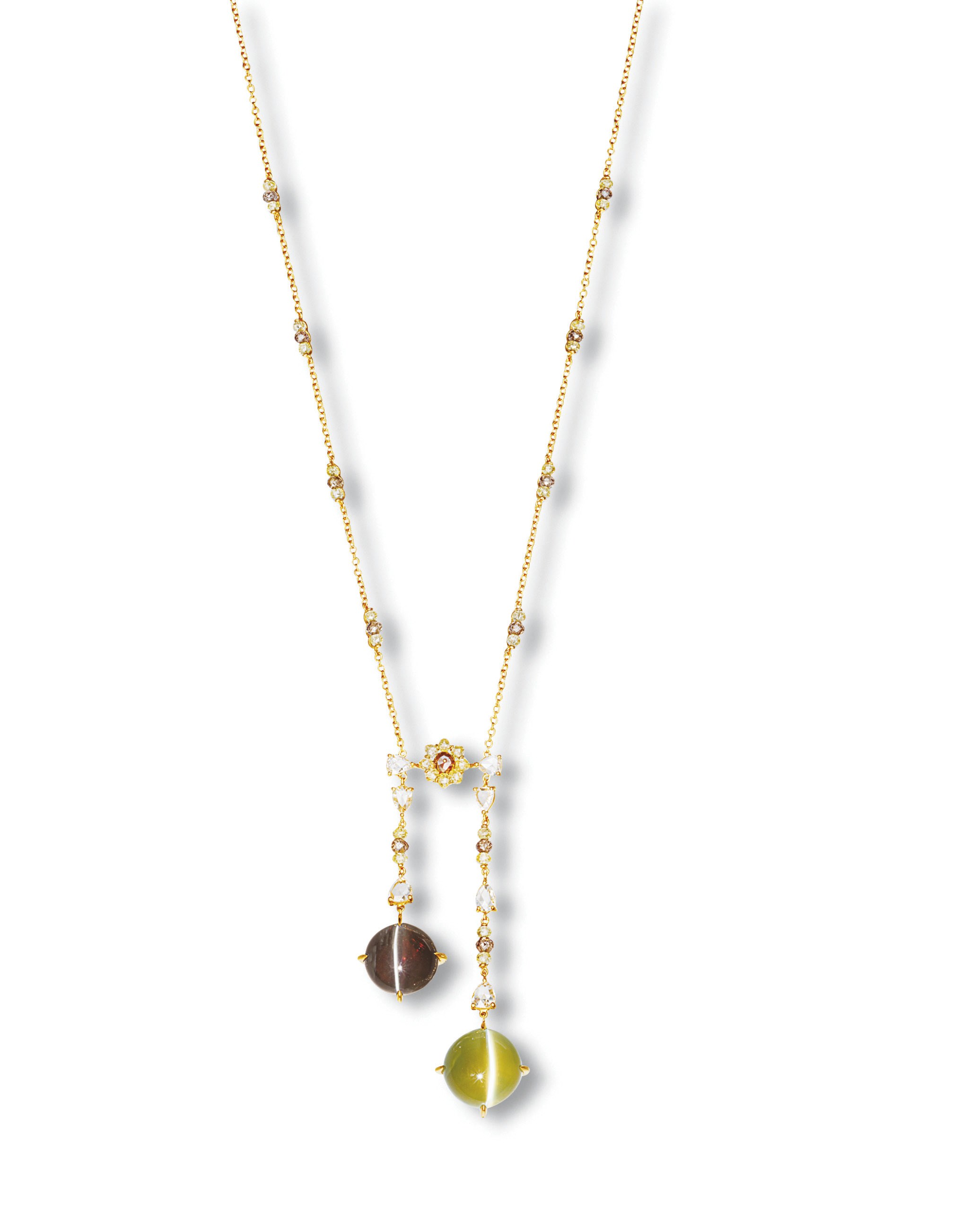 A CAT'S EYE ALEXANDRITE AND CAT'S EYE CHRYSOBERYL PENDENT NECKLACE