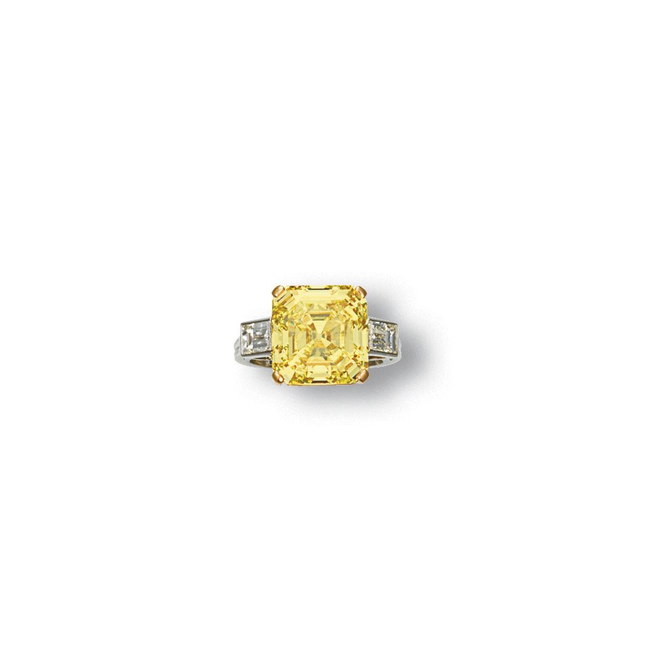AN IMPORTANT COLOURED DIAMOND AND DIAMOND RING