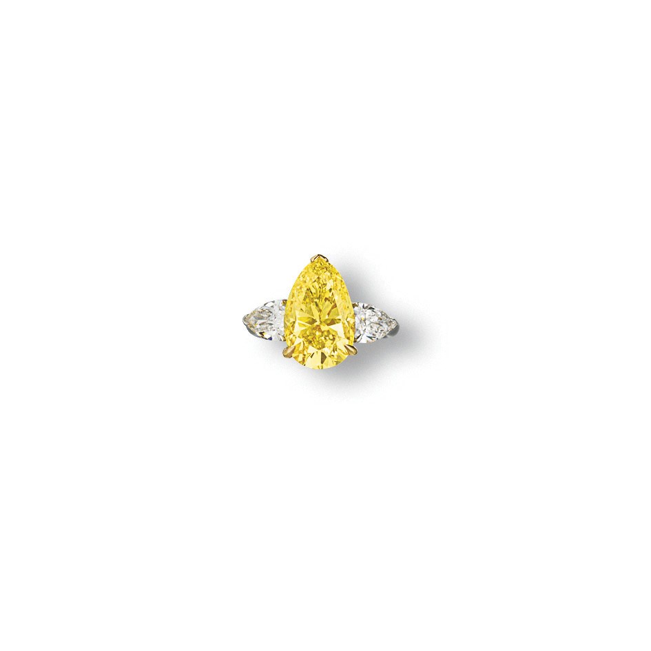 AN IMPORTANT COLOURED DIAMOND AND DIAMOND RING