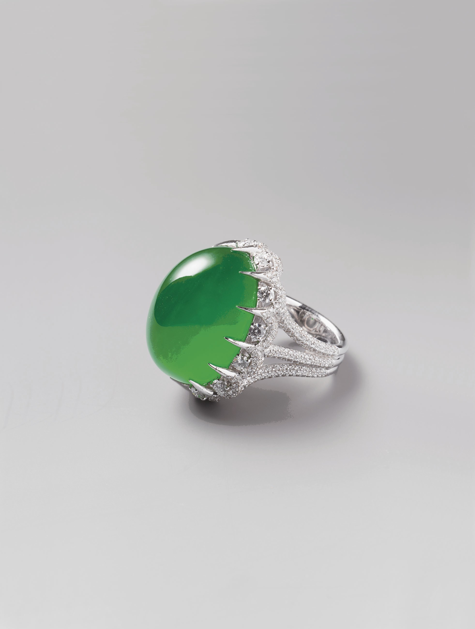 A JADEITE RING AND DIAMOND RING