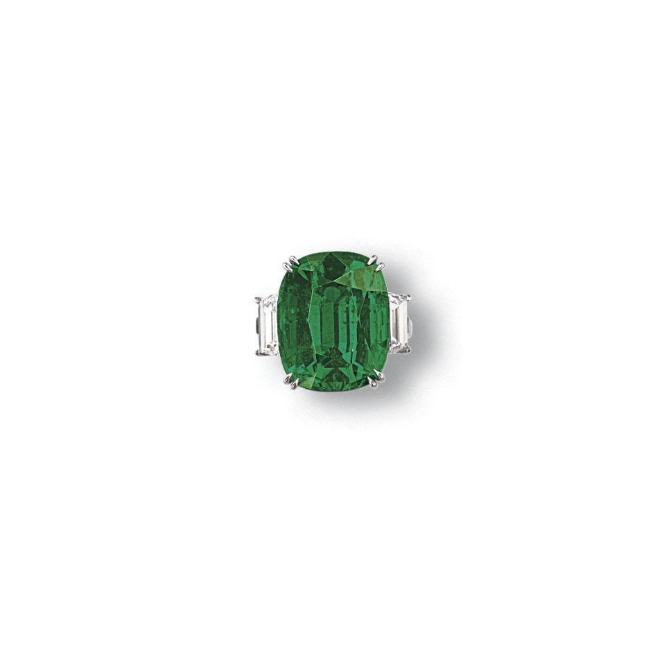 A RARE EMERALD AND DIAMOND RING