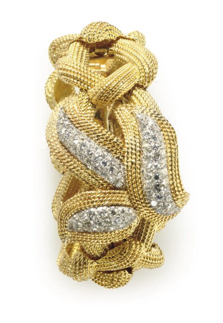 A DIAMOND AND GOLD BRACELET