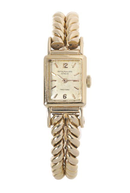 AN 18K GOLD BRACELET-WATCH, BY PATEK PHILIPPE