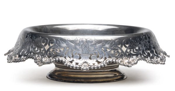 AN AMERICAN SILVER BOWL WITH AN ENGRAVED AND PIERCED EVERTED RIM,