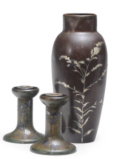 A PAIR OF AMERICAN SILVER-INLAID COPPER CANDLESTICKS,
