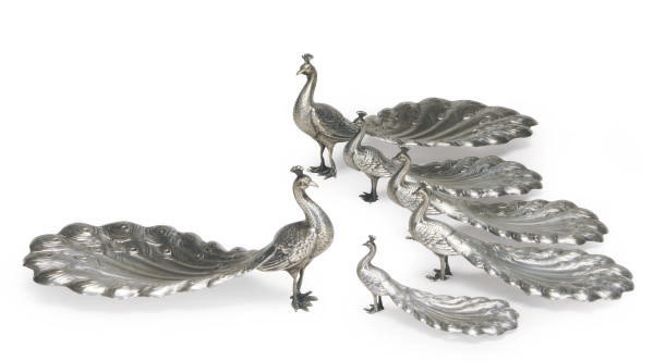 A GROUP OF SIX AMERICAN SILVER PEACOCK-FORM TABLE ORNAMENTS IN GRADUATED SIZES,