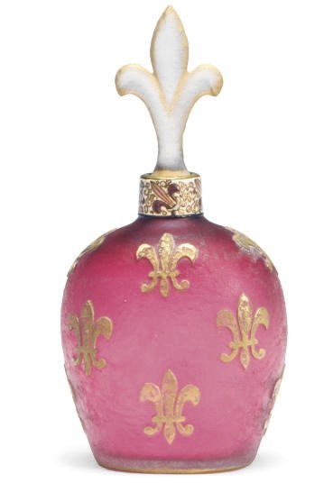 A FRENCH GILT AND ENAMELED FLACON AND STOPPER,