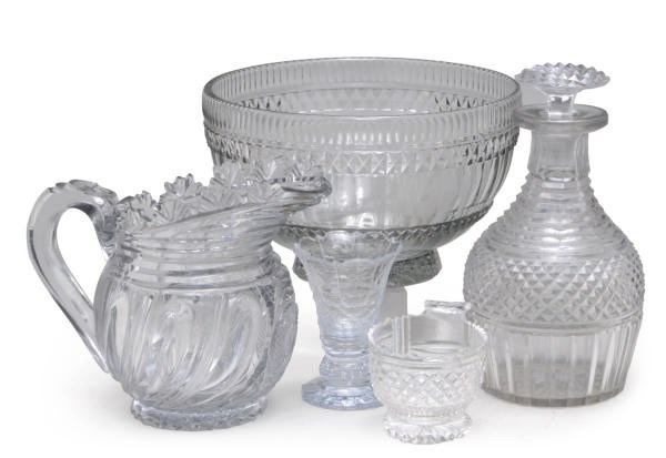 AN ASSEMBLED GROUP OF CUT GLASS DRINKWARE,