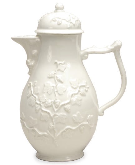 A GERMAN PORCELAIN WHITE GRAPE VINE SPRIGGED COFFEE POT AND COVER,