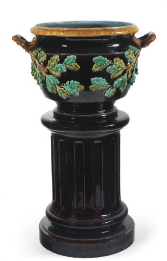 A FRENCH MAJOLICA JARDINERE AND A FLUTED PEDESTAL,