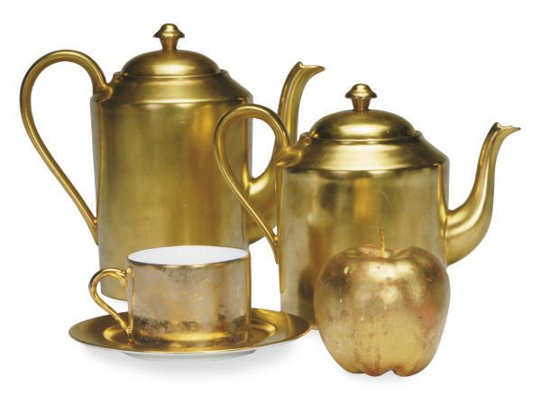 AN ASSEMBLED GOLD GROUND PART TEA AND COFFEE SERVICE,