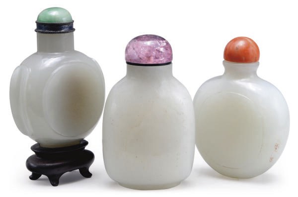 A GROUP OF THREE CHINESE WHITE JADE SNUFF BOTTLES,**
