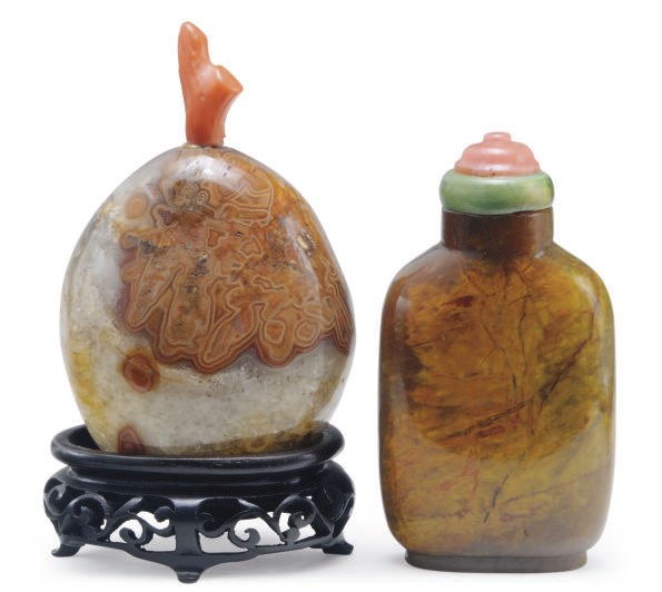 A CHINESE MACARONI AGATE SNUFF BOTTLE AND A JASPER SNUFF BOTTLE,**